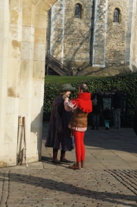 At the Tower of London, and here we see some people dressed like people used to dress in the medieval period.  Boys wore tights!  What do you think about the clothes?  